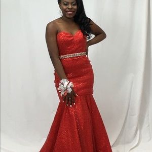 red sequin mermaid prom dress with jeweled belt